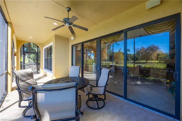 View of patio / terrace with ceiling fan and outdoor dining space