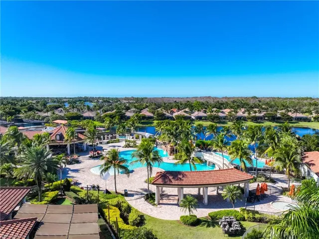 Aerial perspective of suburban area with a pool area