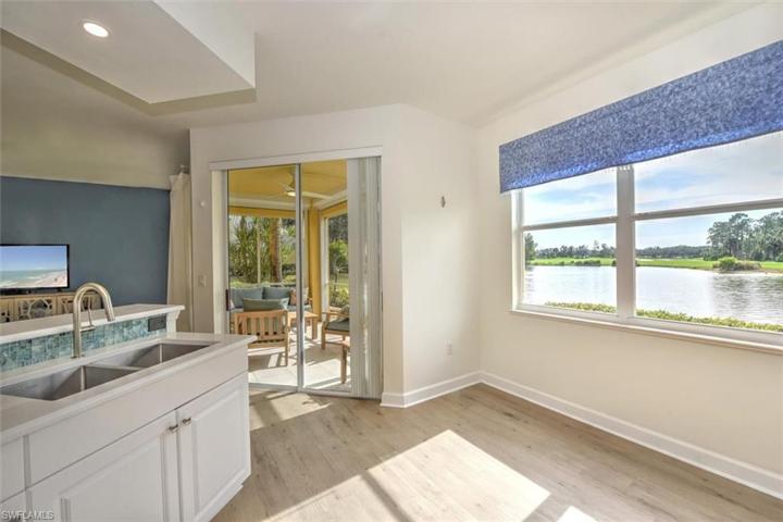 Exceptional waterfront views from kitchen, living room & screened lanai!
