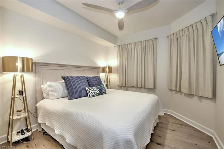 Guest bedroom highlights the updated laminate flooring!