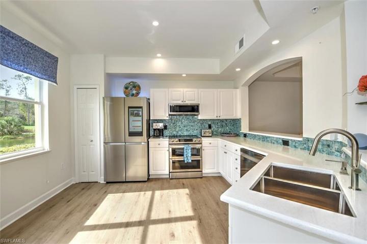 Another view of sun-filled kitchen with lots of ambient daylight!
