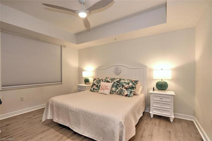 Master bedroom w/tray ceiling and lighted fan!