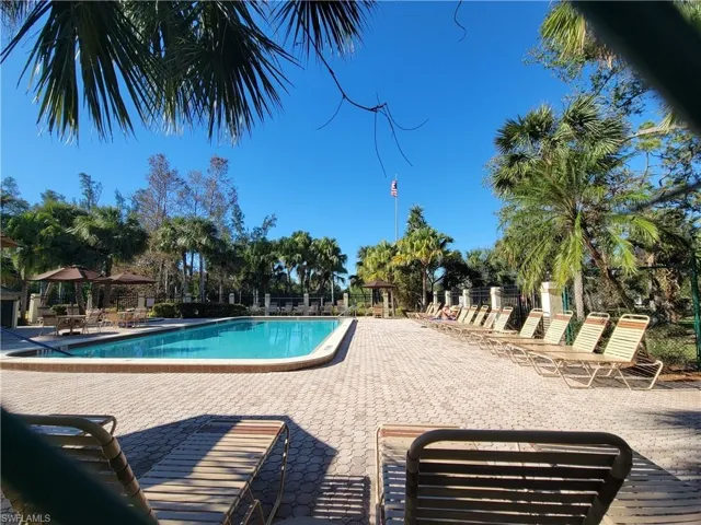 View of swimming pool featuring a gazebo and a patio