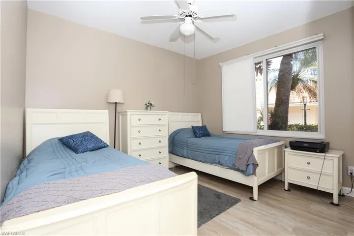 Bedroom featuring light wood-style floors and ceiling fan