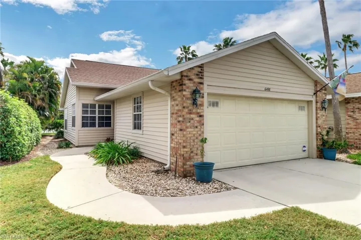 Single story home featuring a garage