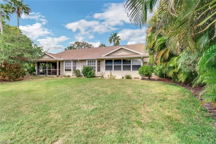 View of front of house with a front lawn