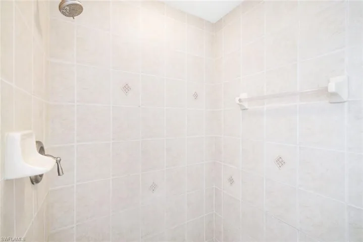 Bathroom with a tile shower