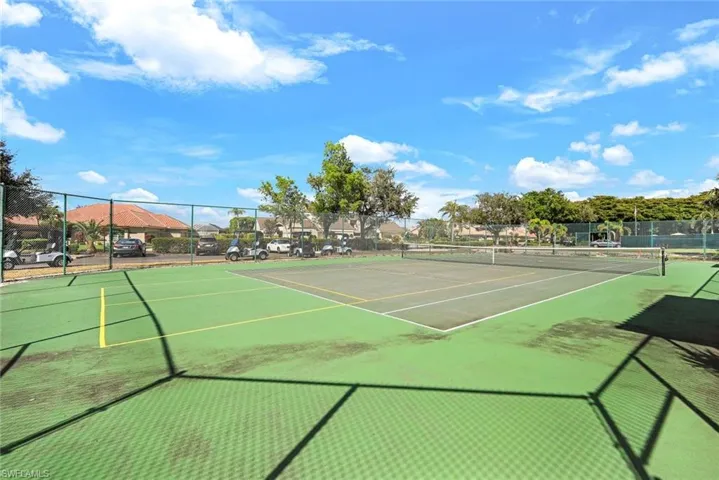 View of tennis court with basketball court