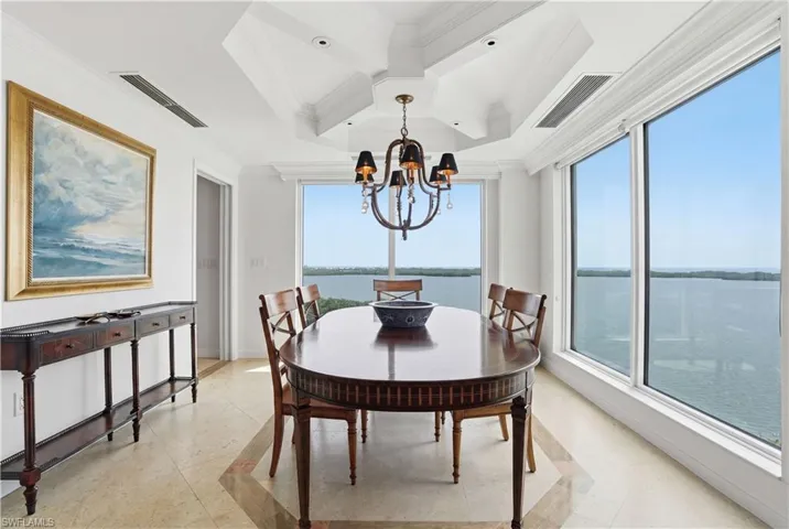 Dine with friends and family as the sun sets over Estero Bay.