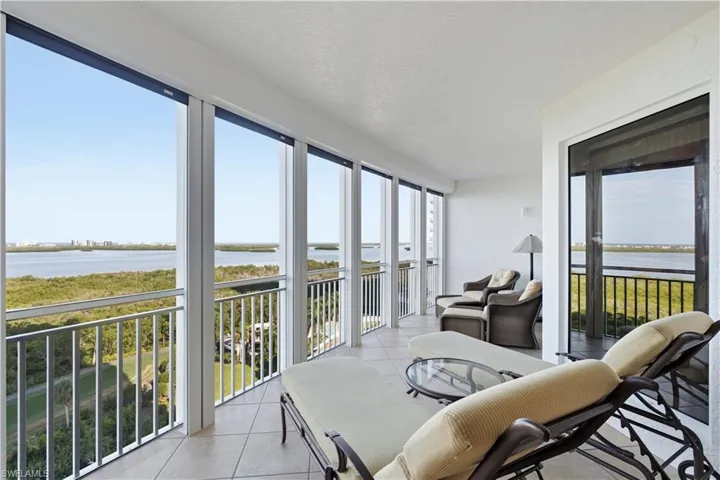 Expansive screened lanai overlooking the Gulf and bay.