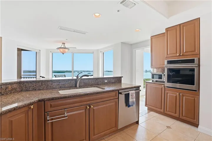 The kitchen is bathed in natural light.