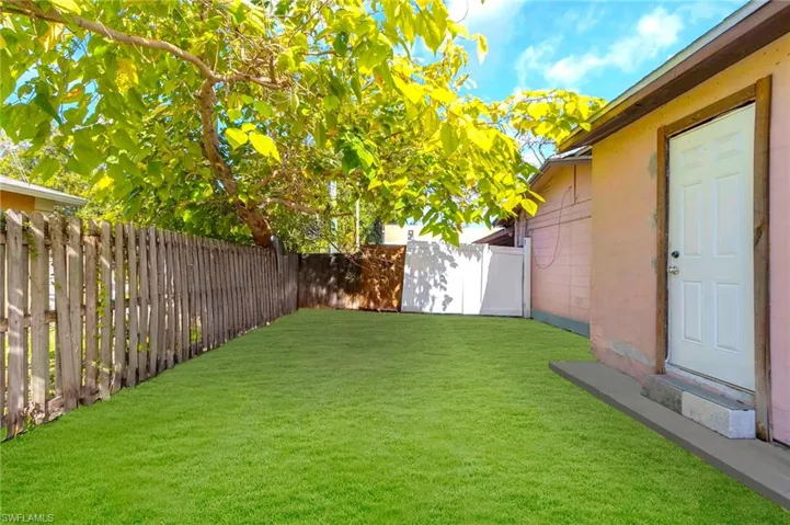 View of fenced backyard