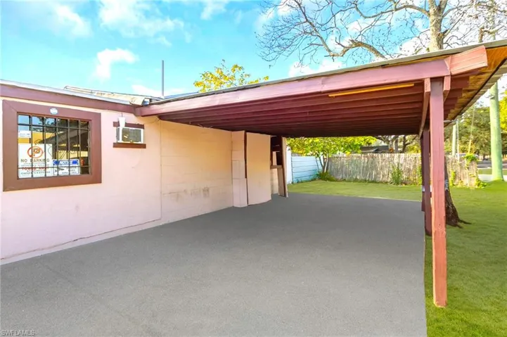 View of patio with an attached carport