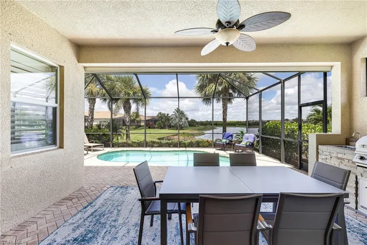 View from Great Room onto Lanai / Pool/ Lake