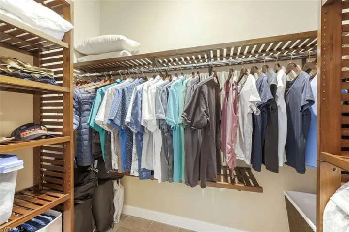 Spacious closet featuring tile patterned floors