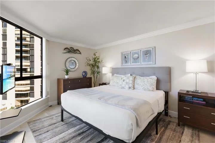 King sized bed and full size window