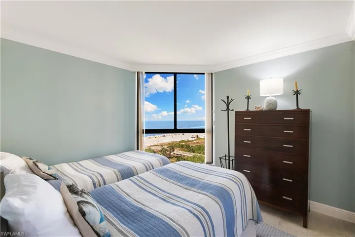 Guest bedroom also with full sized window and another great view