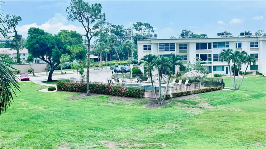 View of home's community with a pool