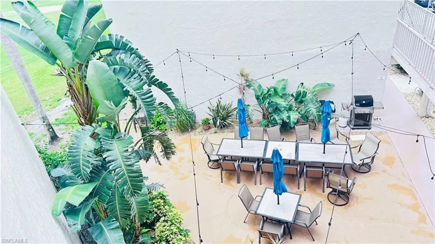 View of patio / terrace featuring outdoor dining space and grilling area