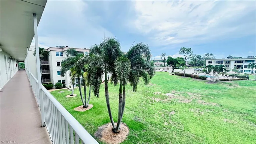 Surrounding community featuring a yard and a garden