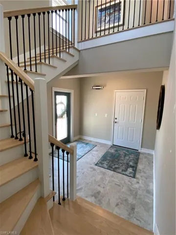 Entrance foyer with a towering ceiling