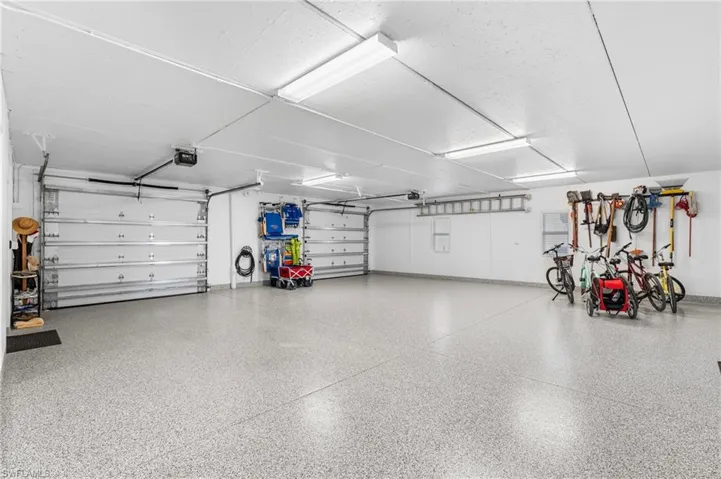 Garage featuring a garage door opener