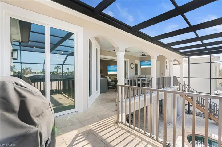 View from grilling area on balcony to outdoor living space
