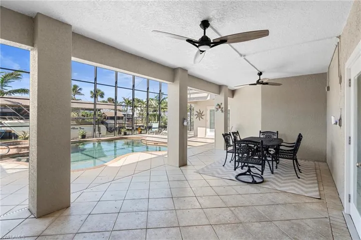 View of patio ground floor terrace featuring ceiling fan