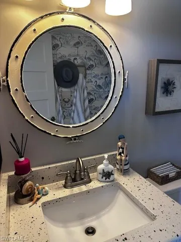 Bathroom with vanity and toilet