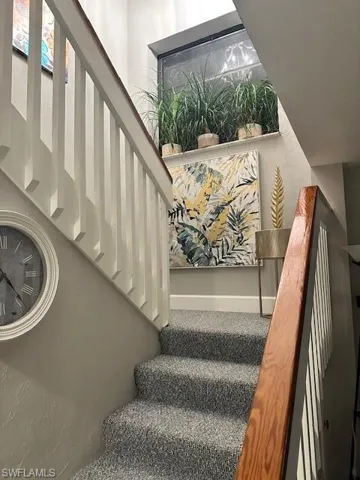 Staircase with a textured wall