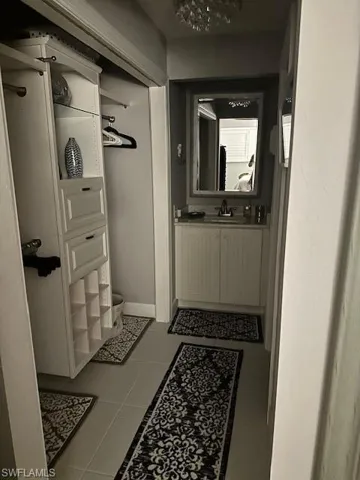Bathroom featuring vanity and light tile patterned flooring