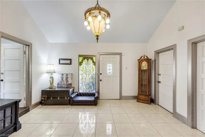 Foyer featuring lofted ceilings