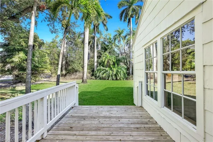 Deck featuring a yard