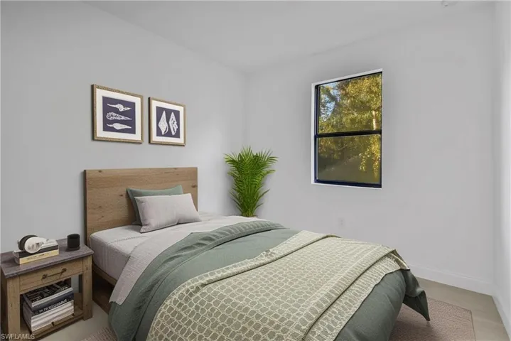 Bedroom featuring baseboards