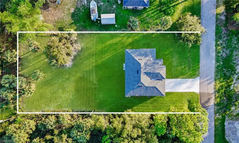 Aerial overview of property's location featuring property parcel outlined