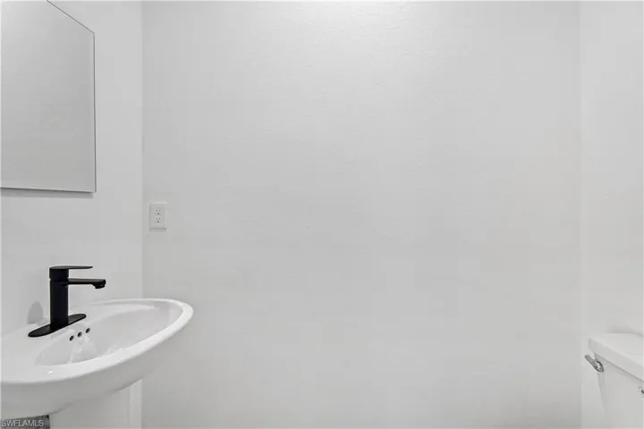 Bathroom with a sink and toilet