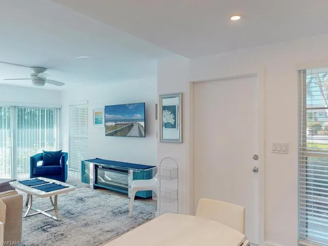 Living room featuring ceiling fan