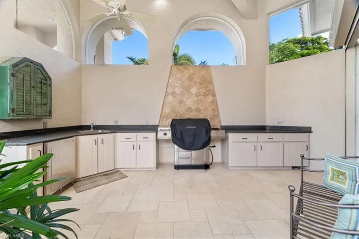 View of patio / terrace featuring a ceiling fan and area for grilling