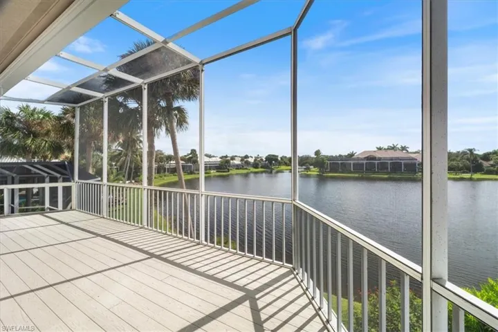 Unfurnished sunroom featuring a water view and healthy amount of natural light