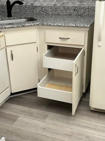 Slide out drawers in the kitchen.