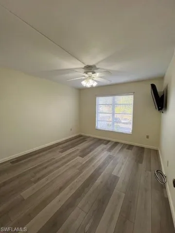 Master Bedroom including wall mounted television.