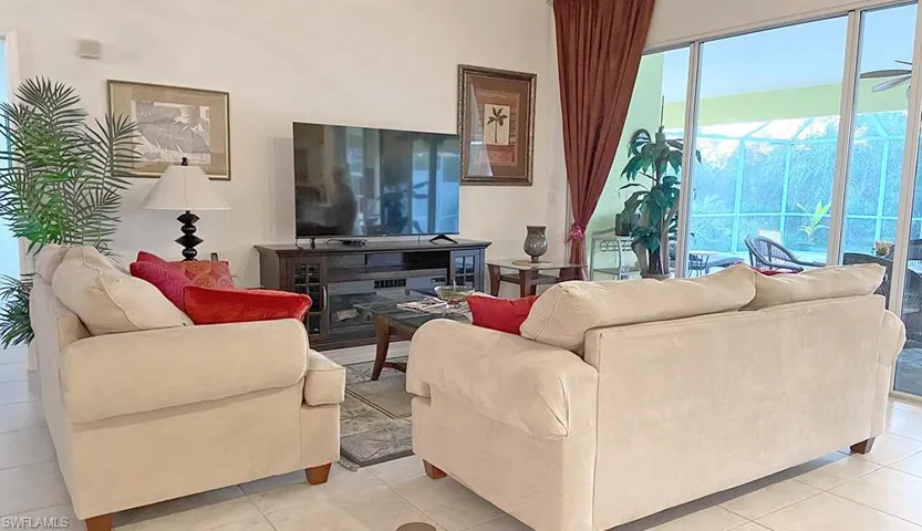 Living room with light tile floors