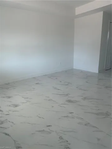 View of tiled spare room