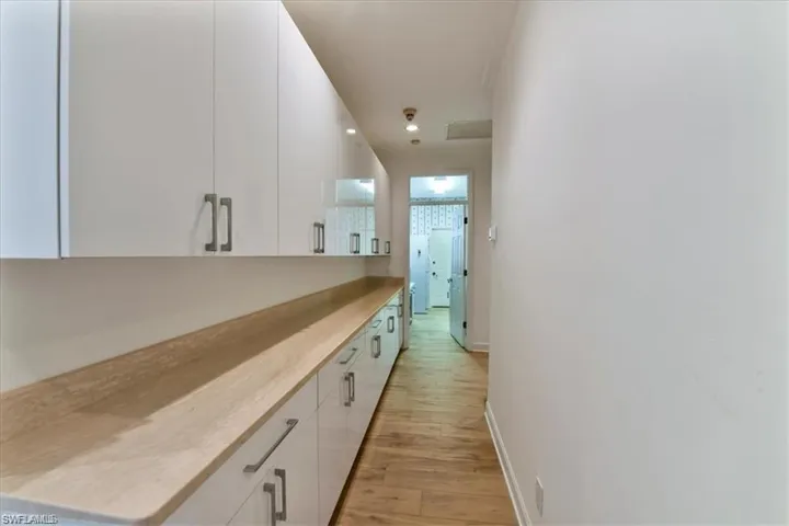 Hall with light wood-type flooring