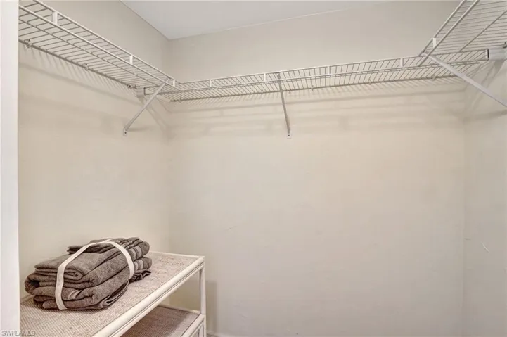 Owner Suite Walk In Closet 1 of 2