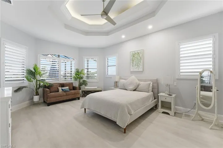 Bedroom featuring light wood-style floors and a ceiling fan