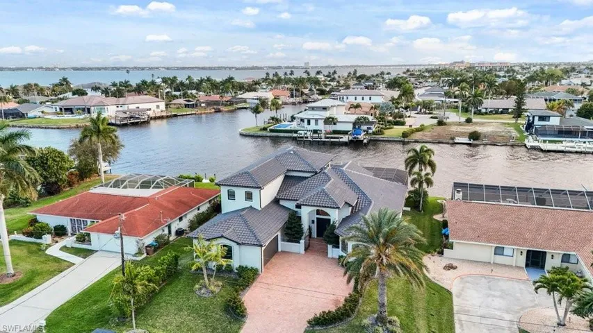 Aerial view of residential area with a large body of water