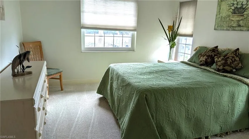 Guest Bedroom #2 Situated far from the Heart of the Home, this Quiet Guest Bedroom is Flooded with Natural Light and a Waterfront View