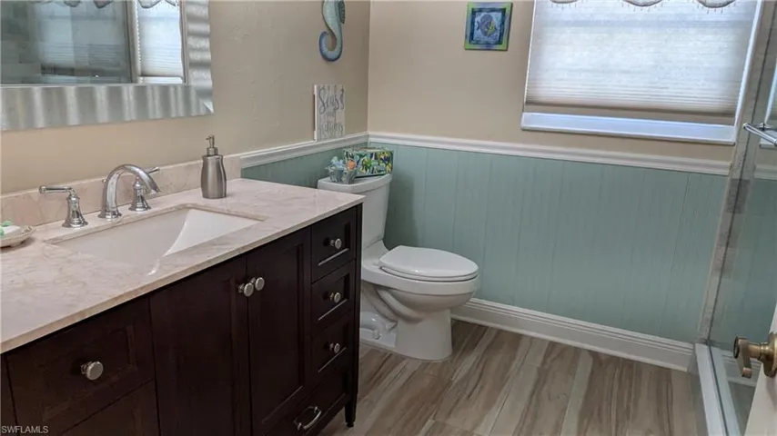 The tastefully updated Guest Bathroom is shared by Guest Bedrooms 1 & 2