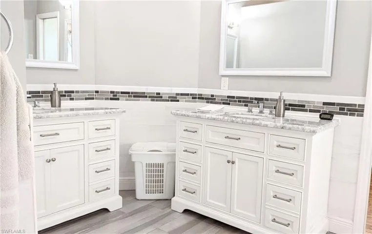 The Main Bedroom En-Suite Features Double Vanities and a Generous Amount of Space & Storage
